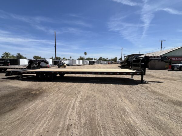 40' Gooseneck Low-Pro Flatdeck with Singles, 15,680 GVWR, Monster Ramps, 14 Ply Tires