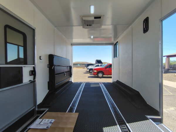 16x8.5 Journey SE Flat Top Sloped V-Nose Car Hauler, 7K GVWR, Slider Window, AC/Heat, Jacknife Sofa, Insulated Walls/Ceiling, Drive Over Wheel Boxes, Rubber Flooring, Power Awning