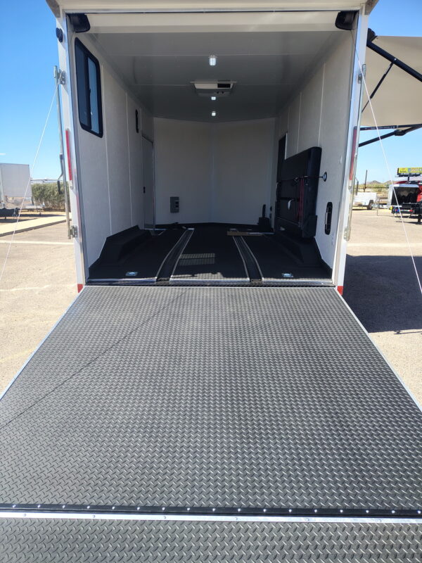 16x8.5 Journey SE Flat Top Sloped V-Nose Car Hauler, 7K GVWR, Slider Window, AC/Heat, Jacknife Sofa, Insulated Walls/Ceiling, Drive Over Wheel Boxes, Rubber Flooring, Power Awning