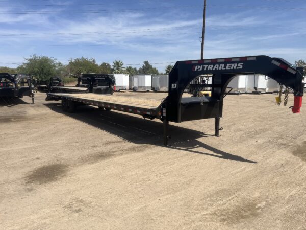 40' Gooseneck Low-Pro Flatdeck with Singles, 15,680 GVWR, Monster Ramps, 14 Ply Tires