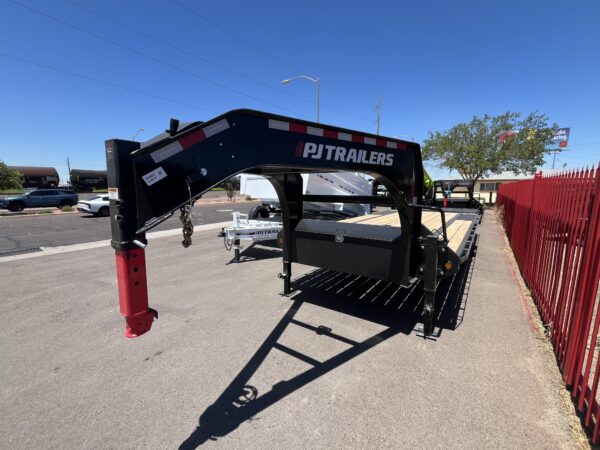 25' Gooseneck Low-Pro Flatdeck with Singles, 15,680 GVWR, Monster Ramps, 14 Ply Tires