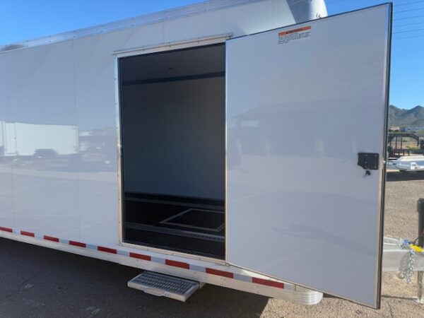 34x8.5 All Aluminum LOADED Car Hauler, Elite Escape Door, Cabinets/Winch, 14K GVWR, Ramp Door