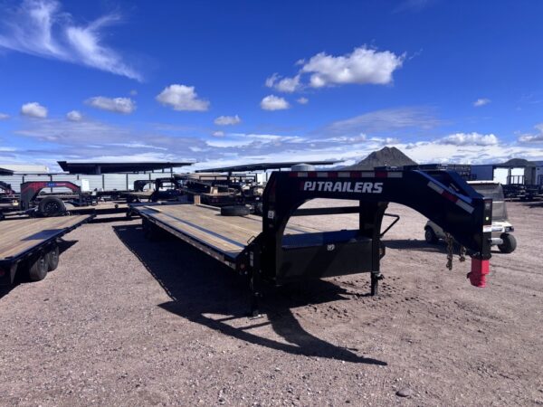 40' Gooseneck Low-Pro Flatdeck with Singles, 15,680 GVWR, Monster Ramps, 14 Ply Tires